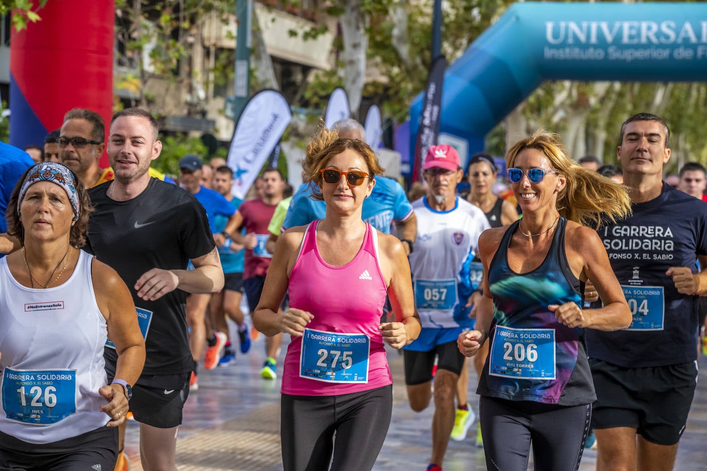 La I Carrera Solidaria Alfonso X de la Feria de Murcia, en imágenes