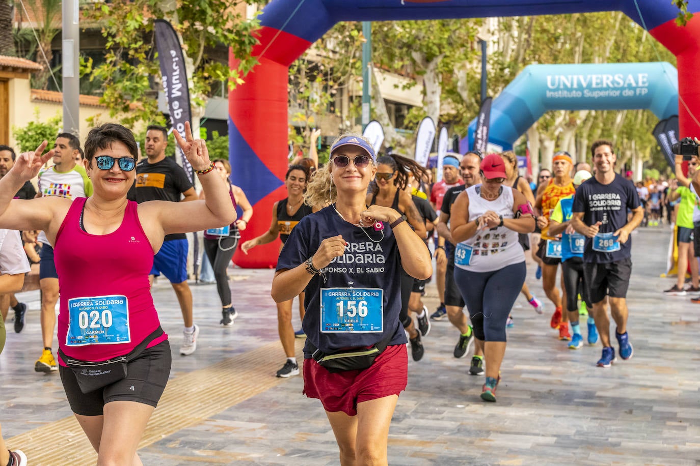 La I Carrera Solidaria Alfonso X de la Feria de Murcia, en imágenes