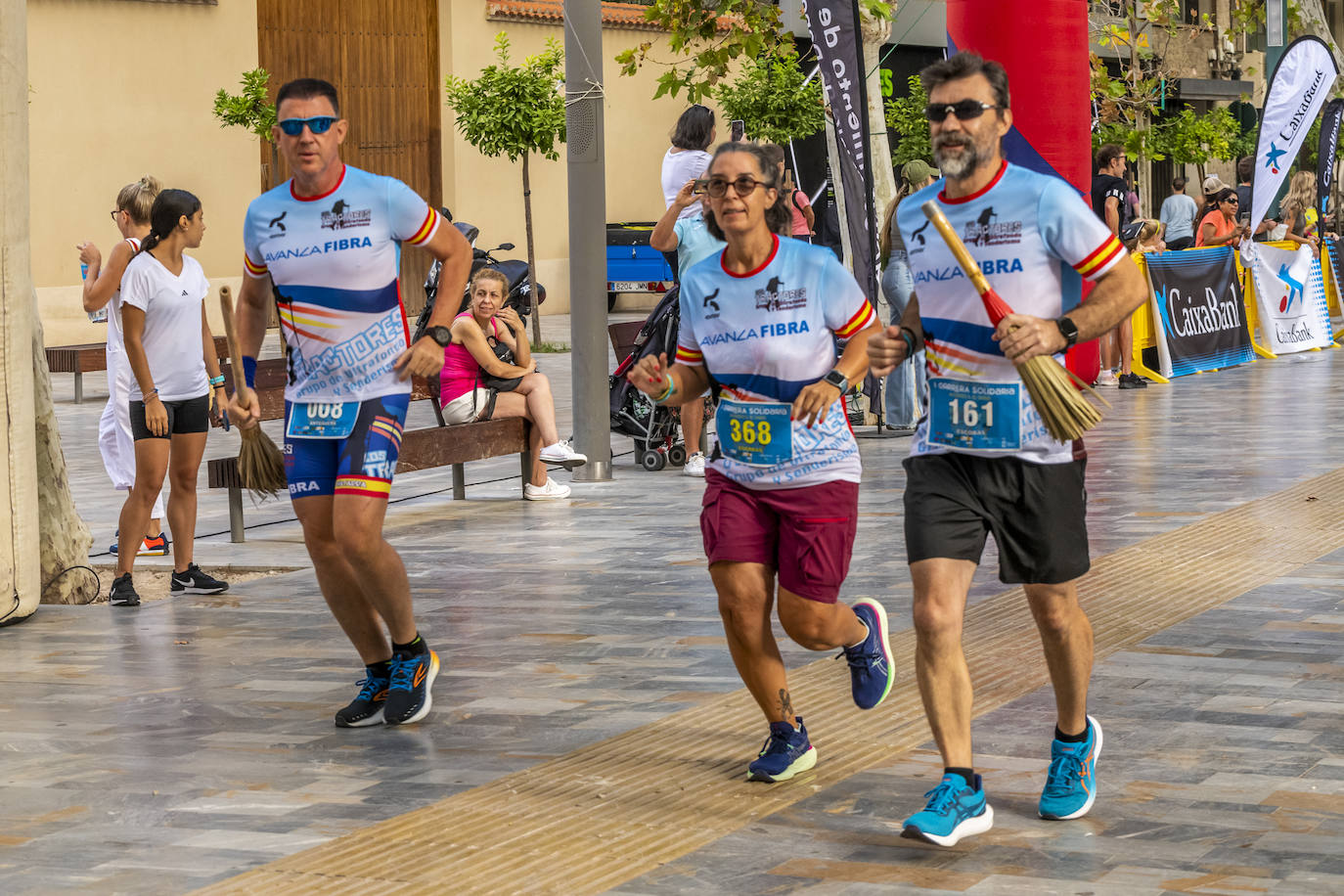 La I Carrera Solidaria Alfonso X de la Feria de Murcia, en imágenes