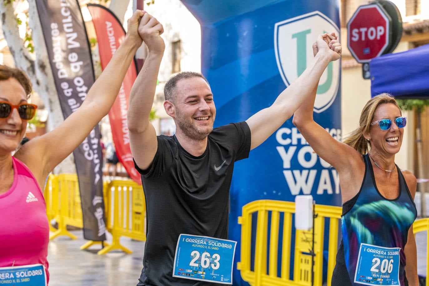 La I Carrera Solidaria Alfonso X de la Feria de Murcia, en imágenes