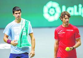Carlos Alcaraz y Juan Carlos Ferrero, en un entrenamiento.