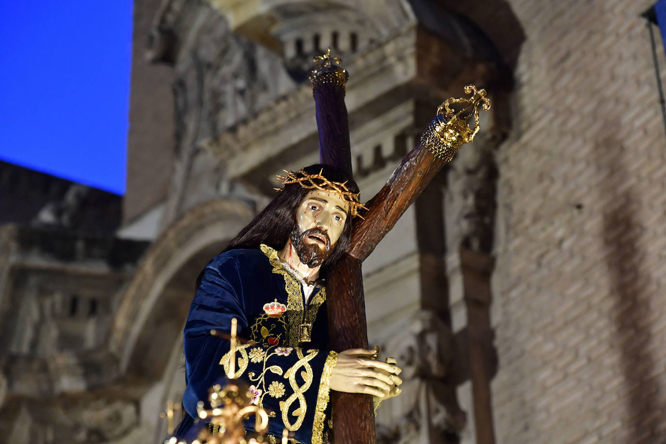 La procesión del Cristo del Amparo del Viernes de Dolores en Murcia, en imágenes