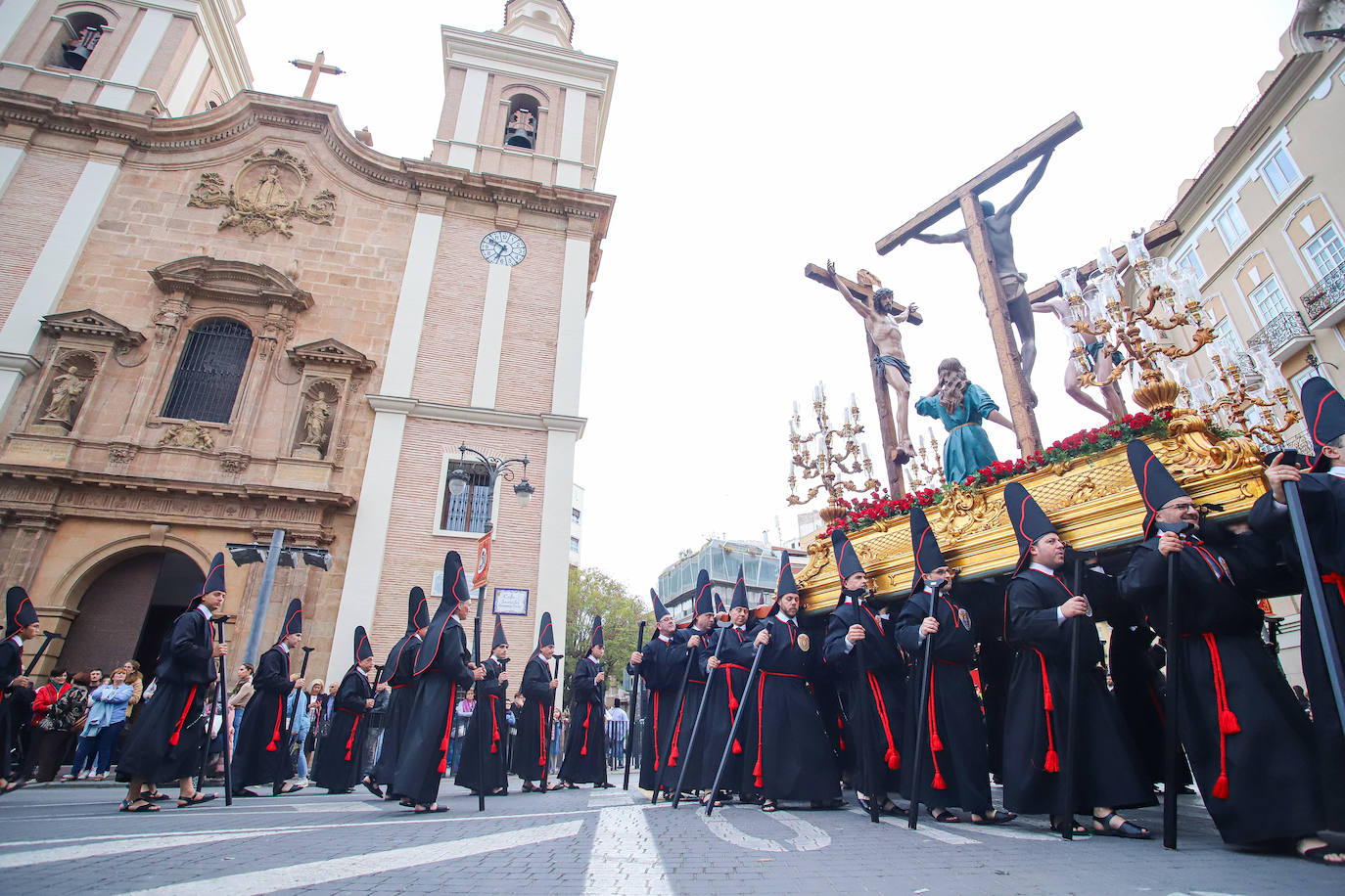 La procesión de la Soledad del Calvario de Murcia, en imágenes