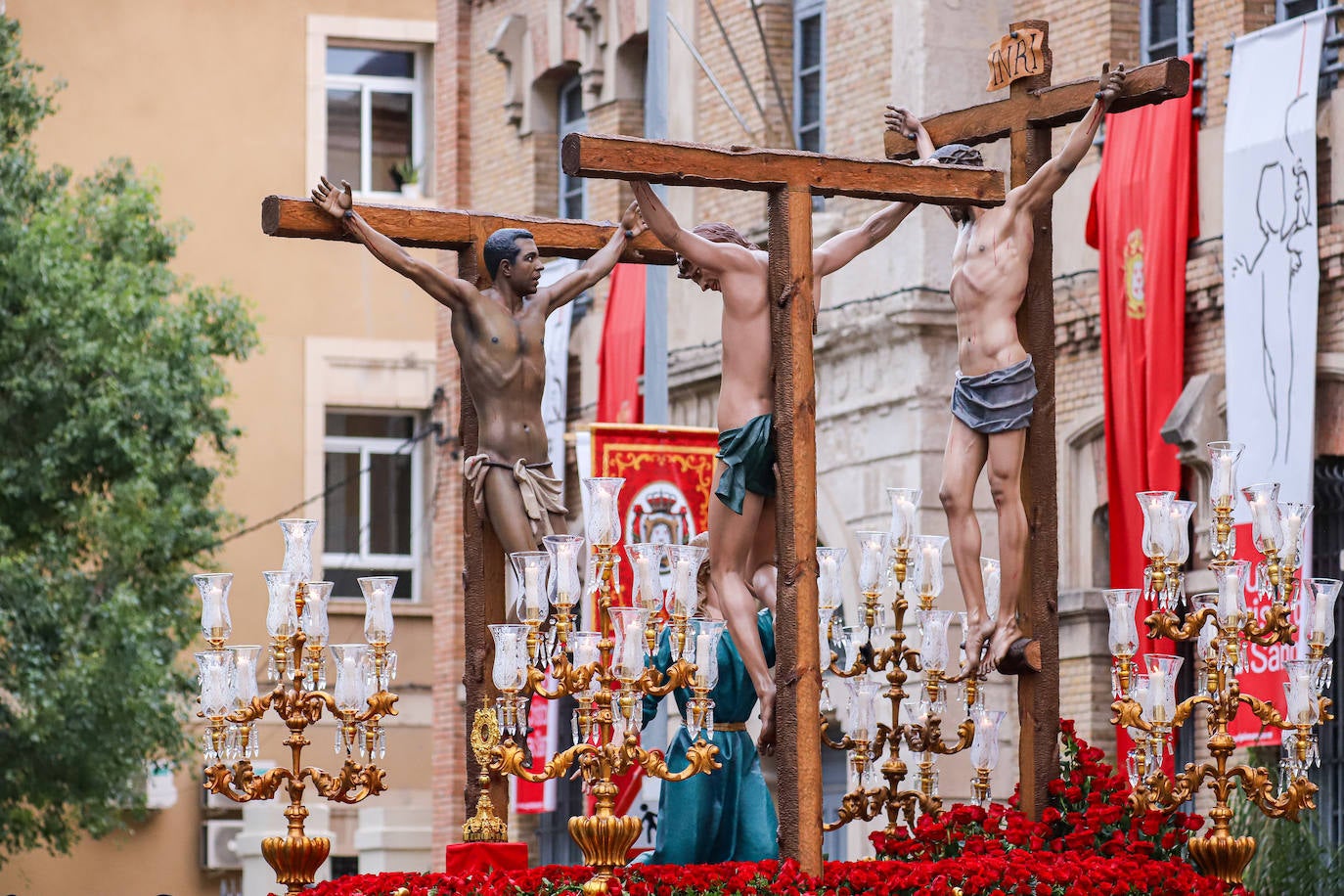 La procesión de la Soledad del Calvario de Murcia, en imágenes