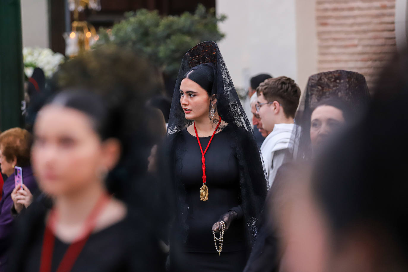 La procesión de la Soledad del Calvario de Murcia, en imágenes