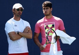 Juan Carlos Ferrero, junto a Carlos Alcaraz, en el US Open de 2023.