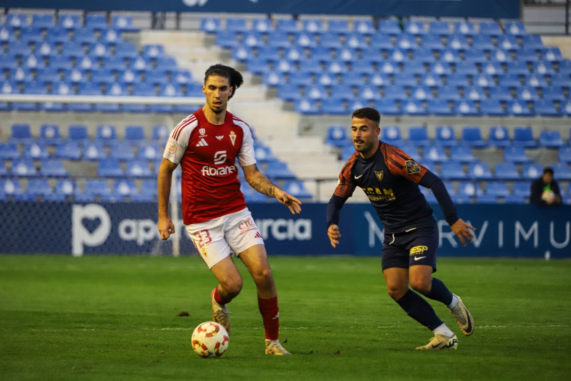 El partido benéfico entre Real Murcia y UCAM, en imágenes