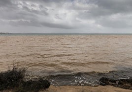 La entrada de agua al Mar Menor a través de la rambla del Albujón, en imágenes