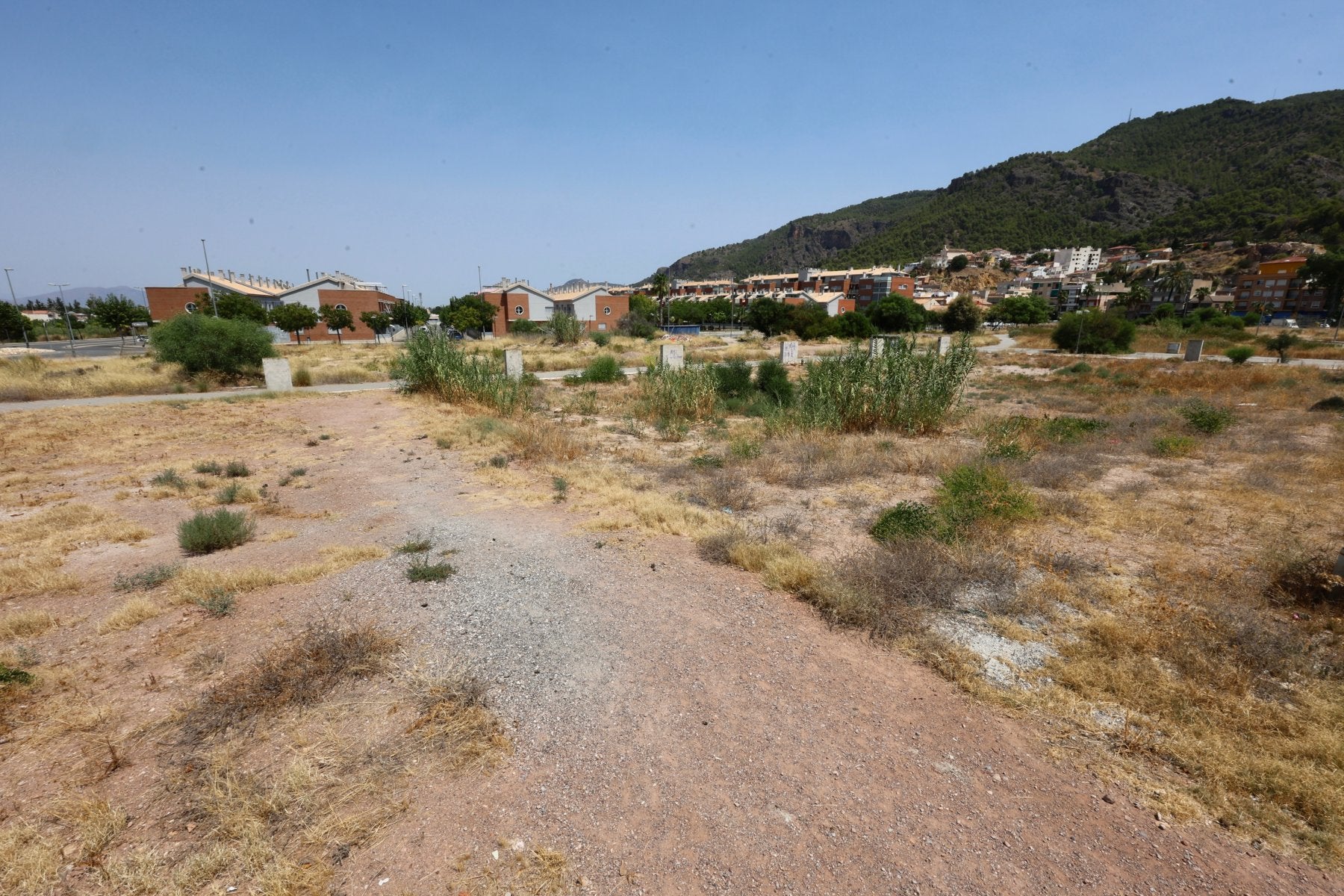 Parcelas pendientes de urbanización en la que se ubicarán las nuevas viviendas, incluidas las del proyecto de 'cohousing'.