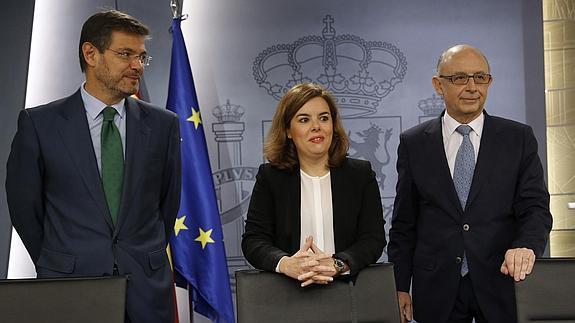 Rafael Catalá, Soraya Sáenz de Santamaría y Cristóbal Montoro.