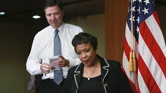 La fiscal general estadounidense, Loretta Lynch y el director del FBI, James Comey.