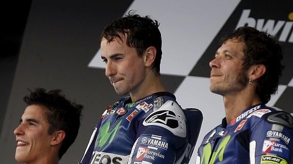 Márquez (i), Lorenzo y Rossi (d), durante el pasado Mundial de MotoGP