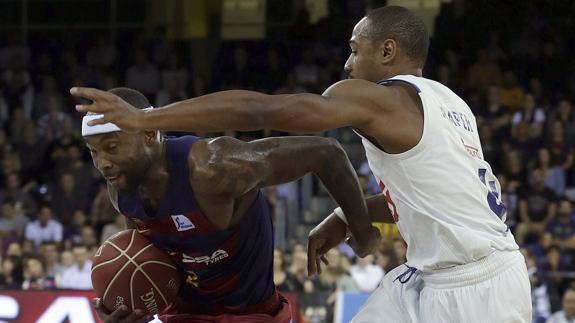 El base Tyrese Rice, frente al madridista Dontaye Draper. 