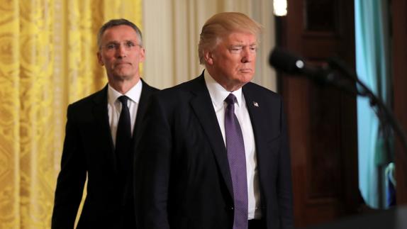 Jens Stoltenberg y Donald Trump.