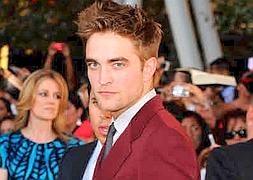 El sexy actor de la saga 'Crepúsculo' se marcha de vacaciones :: AFP