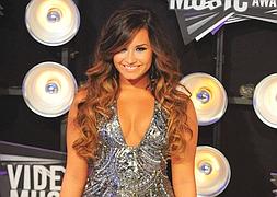Demi Lovato luce figura en los premios MTV :: AFP