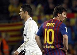 Messi y Cristiano Ronaldo. :: Albert Gea / Reuters