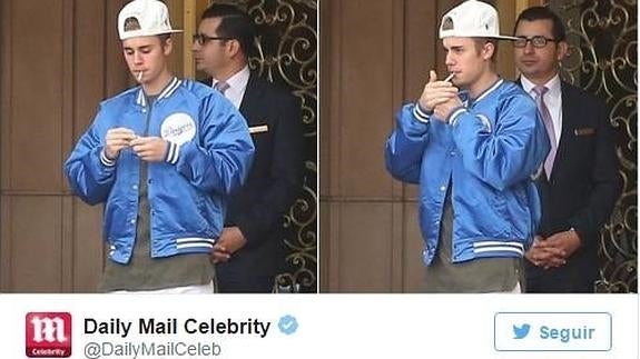 Justin Bieber pillado encendiéndose un cigarro.