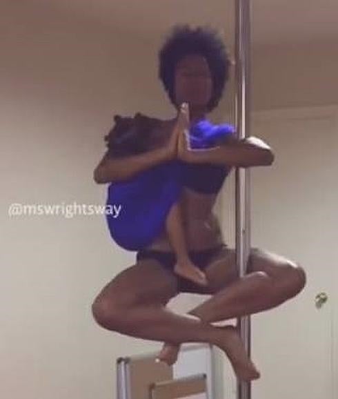 Baila pole dance mientras amamanta a hija