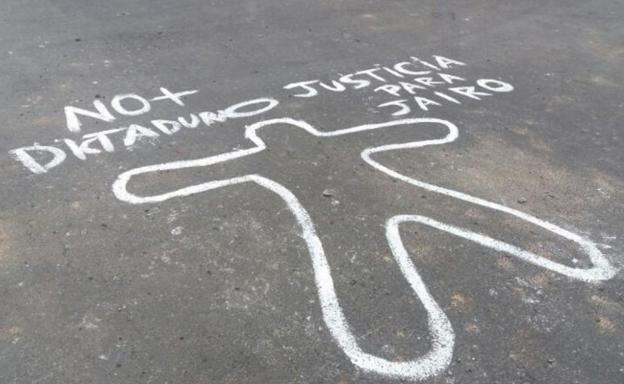 Una pintada denunciando el asesinato de John Jairo Ortiz.