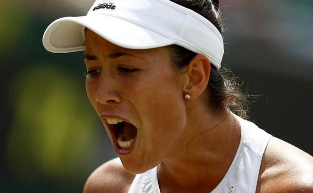 Garbiñe Muguruza celebra la victoria. 