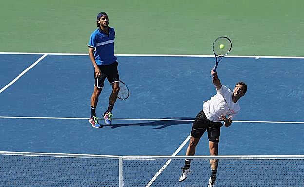 Feliciano y Marc López. durante el partido ante los Bryan. 