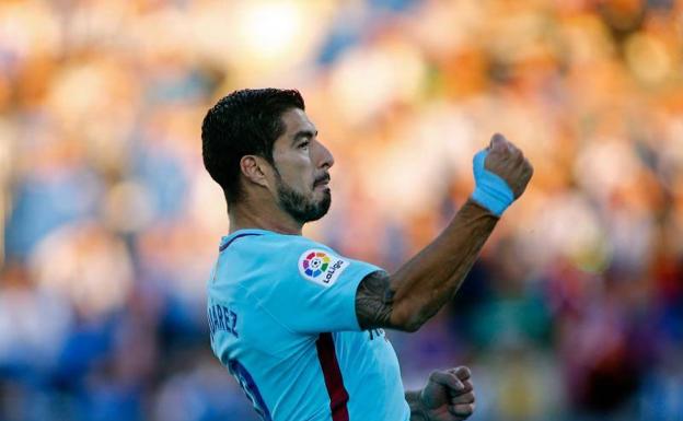 Luis Suárez celebra su doblete en Leganés. 