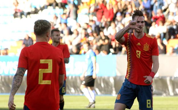 Los jugadores celebran uno de sus goles.