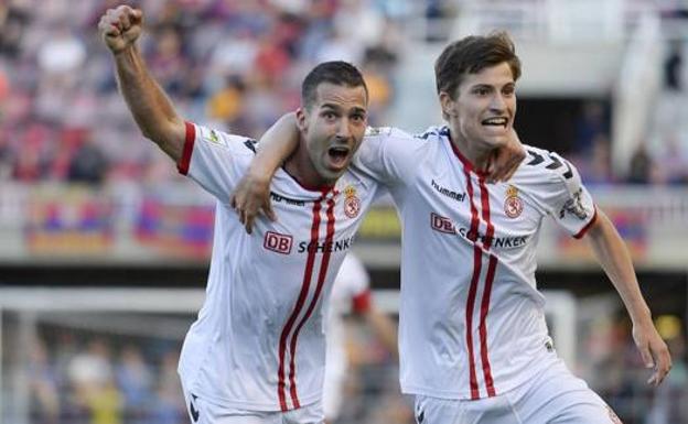 Julen Colinas y Toni Villa celebran uno de los goles del ascenso.