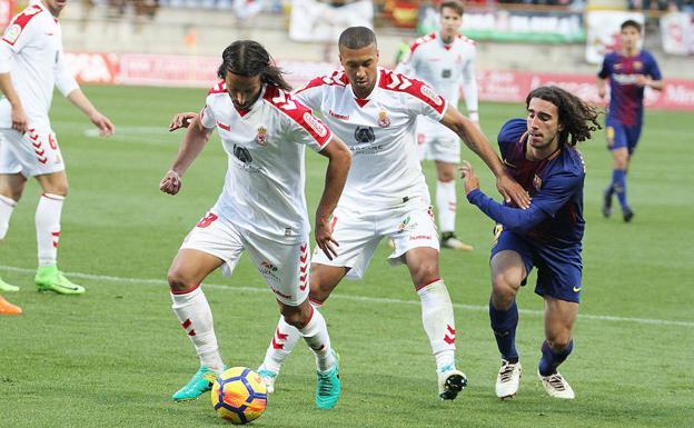 Mario Ortiz y GIanni, durante un partido ante el Barcelona B.