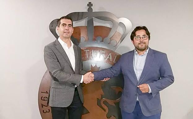 Imagen de la firma del acuerdo.