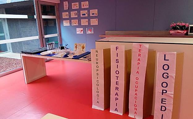 Entrada del taller en la sede de Aspaym.