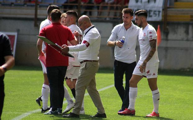 Samu Delgado, con Víctor Cea.