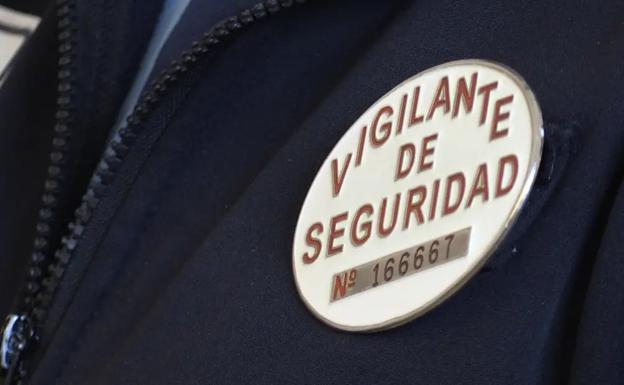 Chapa de un vigilante de seguridad.