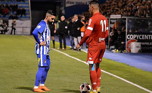 Pichín y Hugo Rodríguez, en el partido de la primera vuelta.