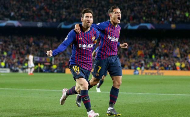 Lionel Messi y Philippe Coutinho celebran el primer gol del argentino.