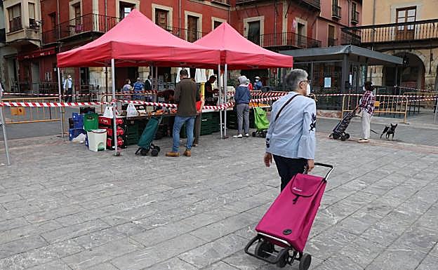 Imagen principal - Detalles del Mercado de la Plaza Mayor. 