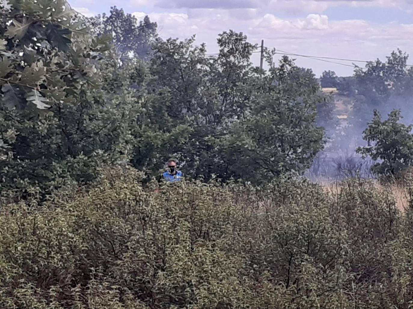 El incendio, cuyas causas se desconocen por el momento, se ha iniciado en torno a las 14:20 horas de este domingo y ha sido controlado por efectivos de Protección Civil