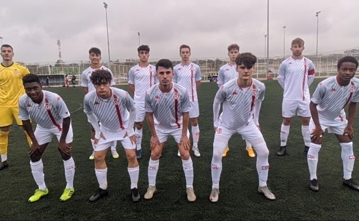 Once inicial del juvenil en el partido de Móstoles.