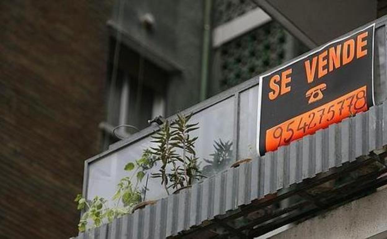 Cartel de una vivienda en venta.