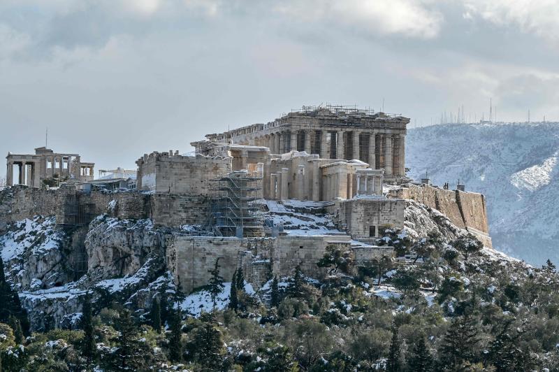 Fotos: La Acrópolis de Atenas, bajo la nieve