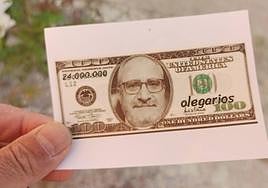 Aparecen billetes de dólar con la cara del candidato del PSOE y actual alcalde de Ponferrada, Olegario Ramón, en la pedanía de Fuentesnuevas.