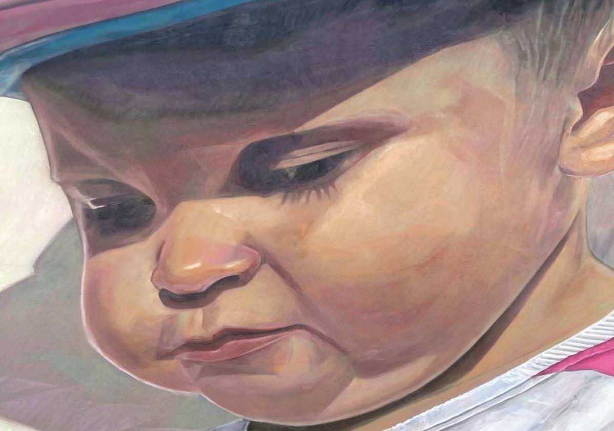 Detalle del mural de Dadospuntocero con el pequeño Álex como protagonista.