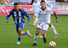 Esquerdo y Bicho, en un lance del partido de este domingo.