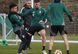 Markel y Bustos, en un entrenamiento de la Deportiva.