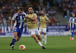 Acción del duelo entre la deportiva y el Guadalajara.