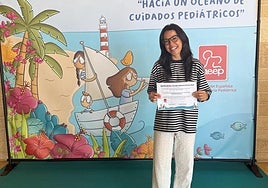 Noelia Purriños recibiendo el premio.