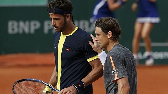 David Ferrer (d), junto a Feliciano López (i) tras su partido de Roland Garros. 