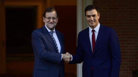 Rajoy y Sánchez. 