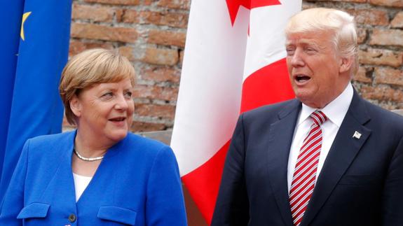 Angela Merkel y Donald Trump durante la cumbre del G7 en Taormina (Italia).